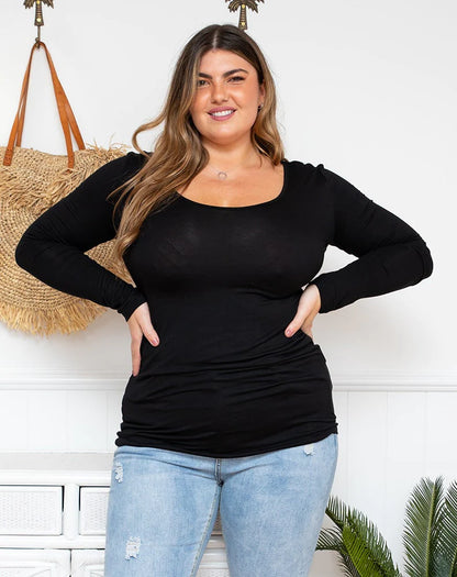 Basic Layering Top: This is the wardrobe staple everyone needs. Perfect for layering under dresses and cardis during the cooler months
Features:

Scoop neckline
Stretch fabric
Long slee - Ciao Bella Dresses - Freez