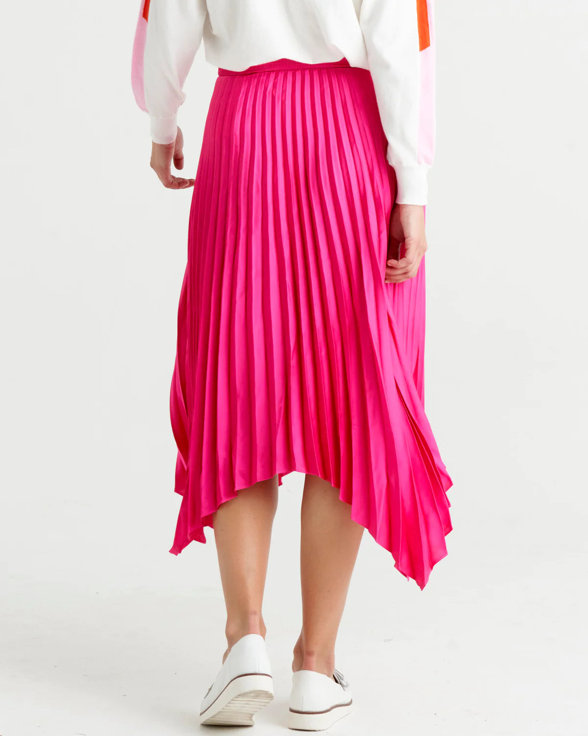 Louis Pleated Skirt: Introducing the Pleated Skirt, where comfort meets playful style in the most laid-back way! With its elastic waistband, this skirt ensures a perfect fit and all-day  - Ciao Bella Dresses - Betty Basics