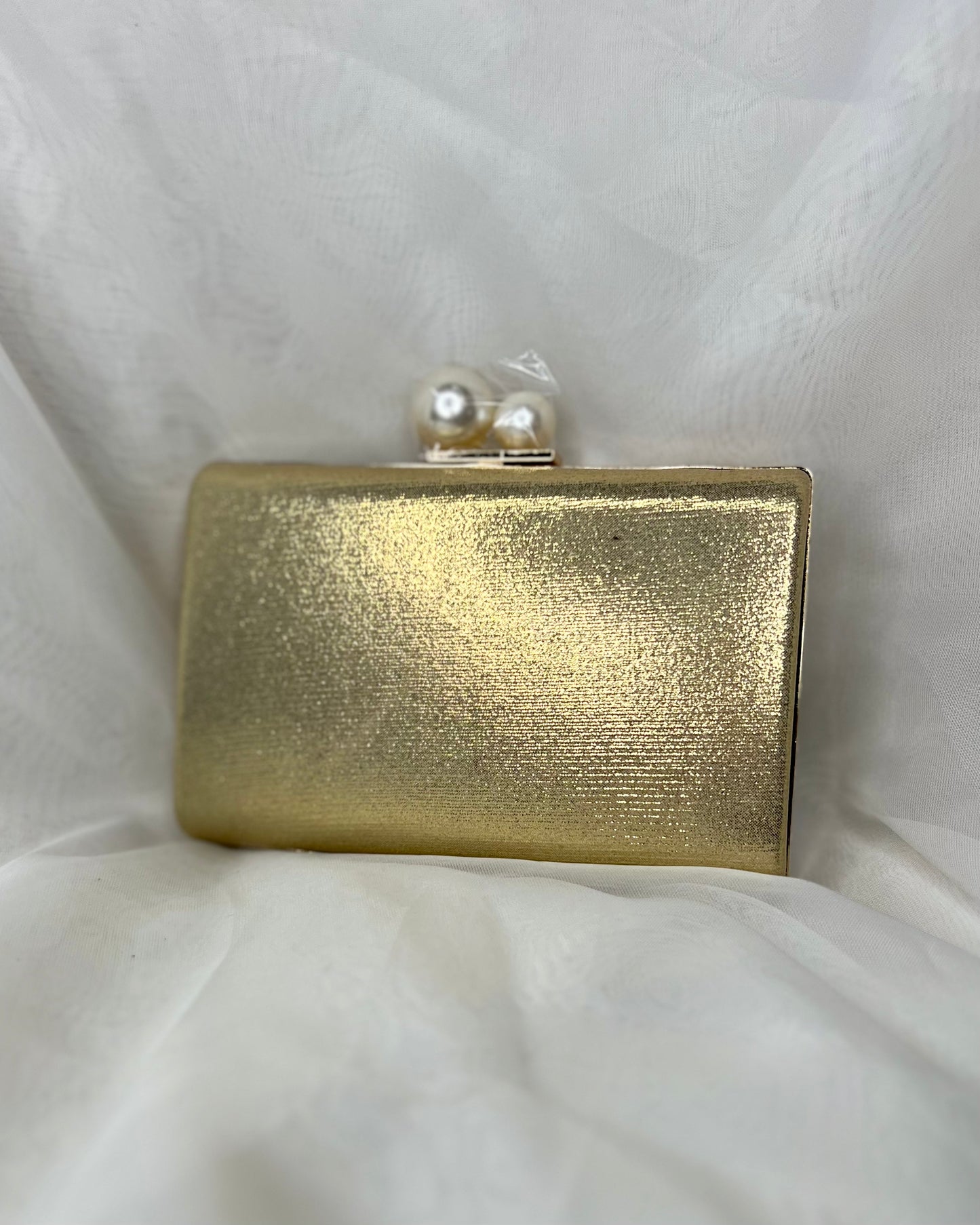 Baguette Evening Bag: Unusual and eye catching, this convertible clutch bag is also lovely to hold.
Dimensions: W 17cm X D 4.5cm X H 11.5cm
Handle Drop: Gold link chain extends to 116cm,  - Ciao Bella Dresses - Sassy Duck