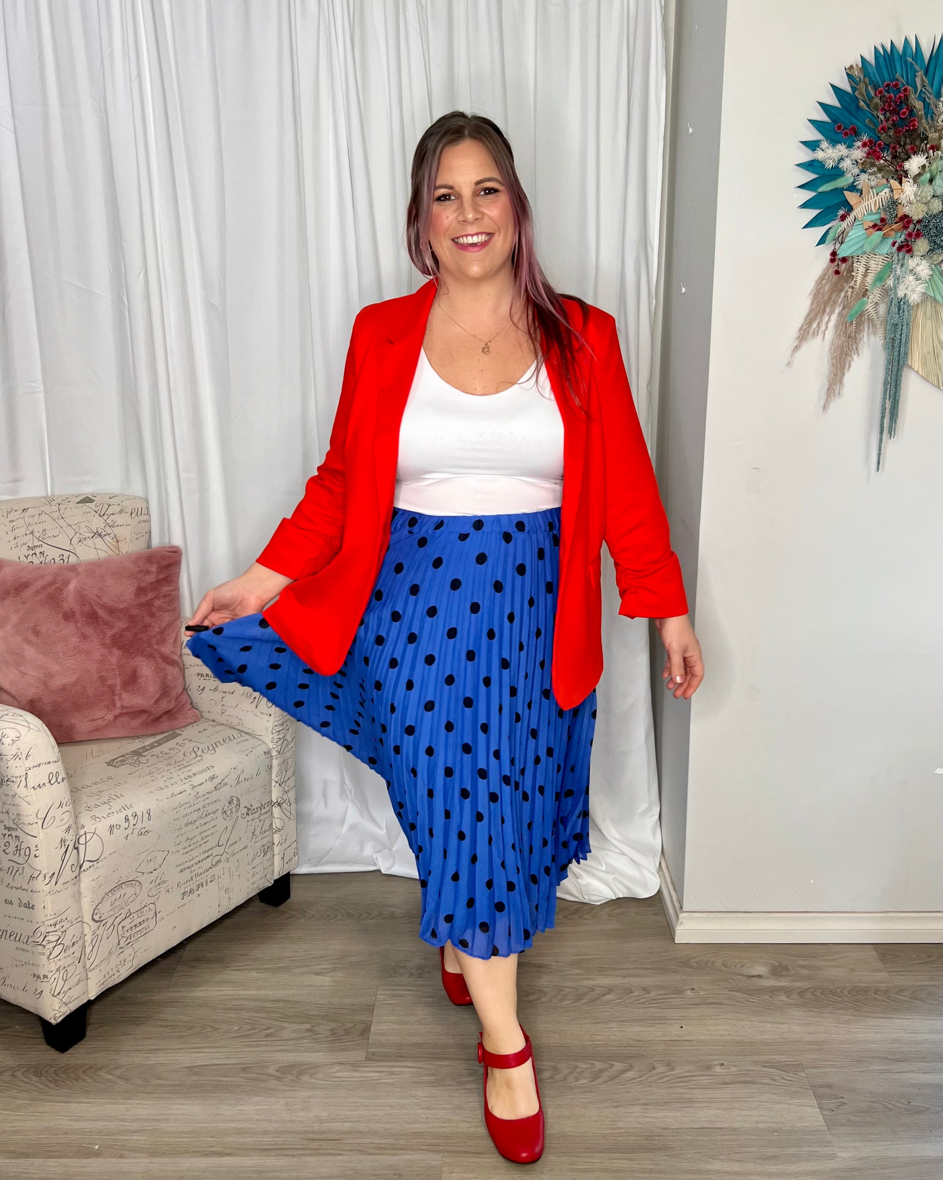 Chanell Pleated Skirt: 
Introducing the Chanel Pleated Skirt, the epitome of fun and laid-back style! With its elastic waistband, this skirt ensures a comfortable and perfect fit for all-d - Ciao Bella Dresses - Betty Basics