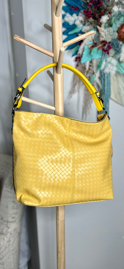 Tegan Woven Shoulder Bag: Fashionably discreet, yet quietly beautiful. The embossed basketweave with matching but slightly contrasting handle colour makes this bag a winner.
Dimensions: W 38c - Ciao Bella Dresses 