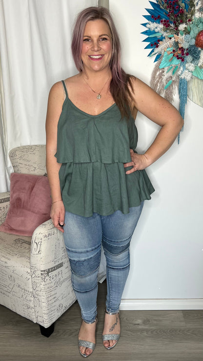 Fifi Cami: 
A two tiered cami, this top is perfect to dress up or dress down with adjustable straps for maximum comfort


Two tiered design
Adjustable straps
V neckline
True to - Ciao Bella Dresses 