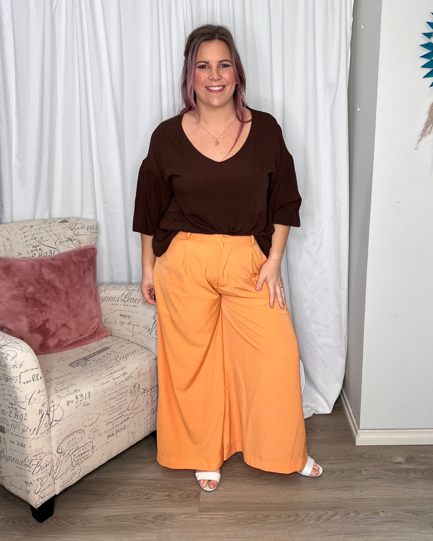 Lillian Palazzo Pants - Melon | Sass Clothing | The Lillian Palazzo Pants are a stunning shape to take you from office to after hours, year round. The pleats at the top streamline into a wide leg for the utmost in