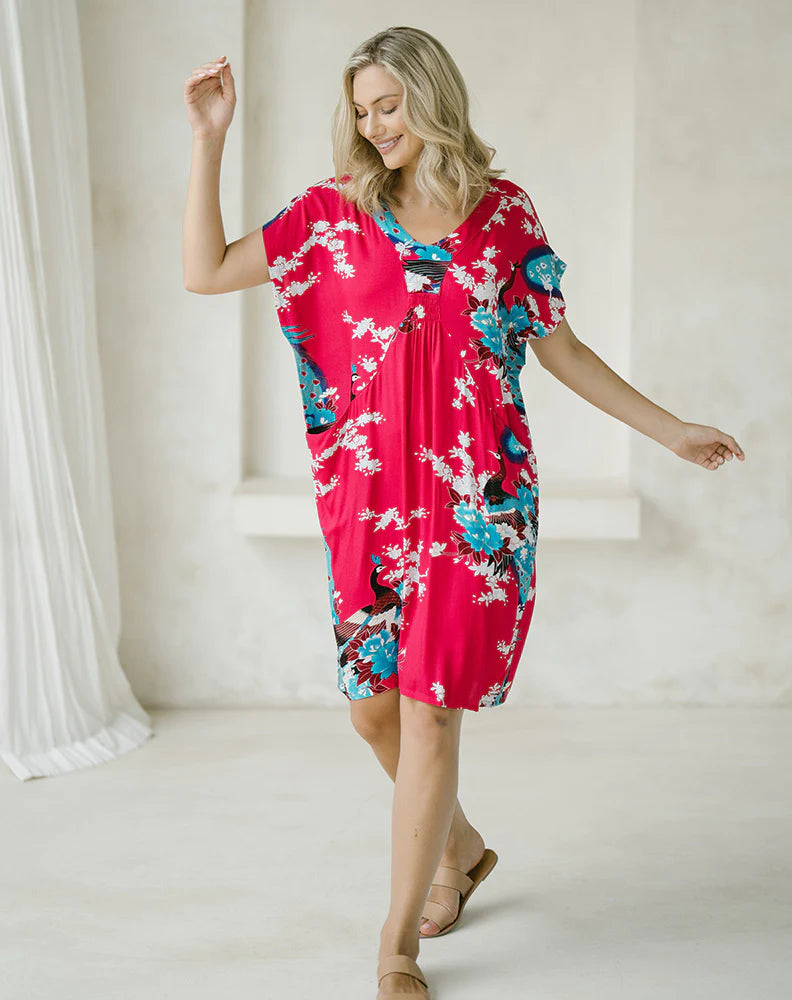 Coastal Dress: 
Achieve a casual, effortless look that is oh-so comfortable. The Coastal Dress is a cocoon shape with an elastic bust detail and concealed pockets
Colour is : Pink  - Ciao Bella Dresses 