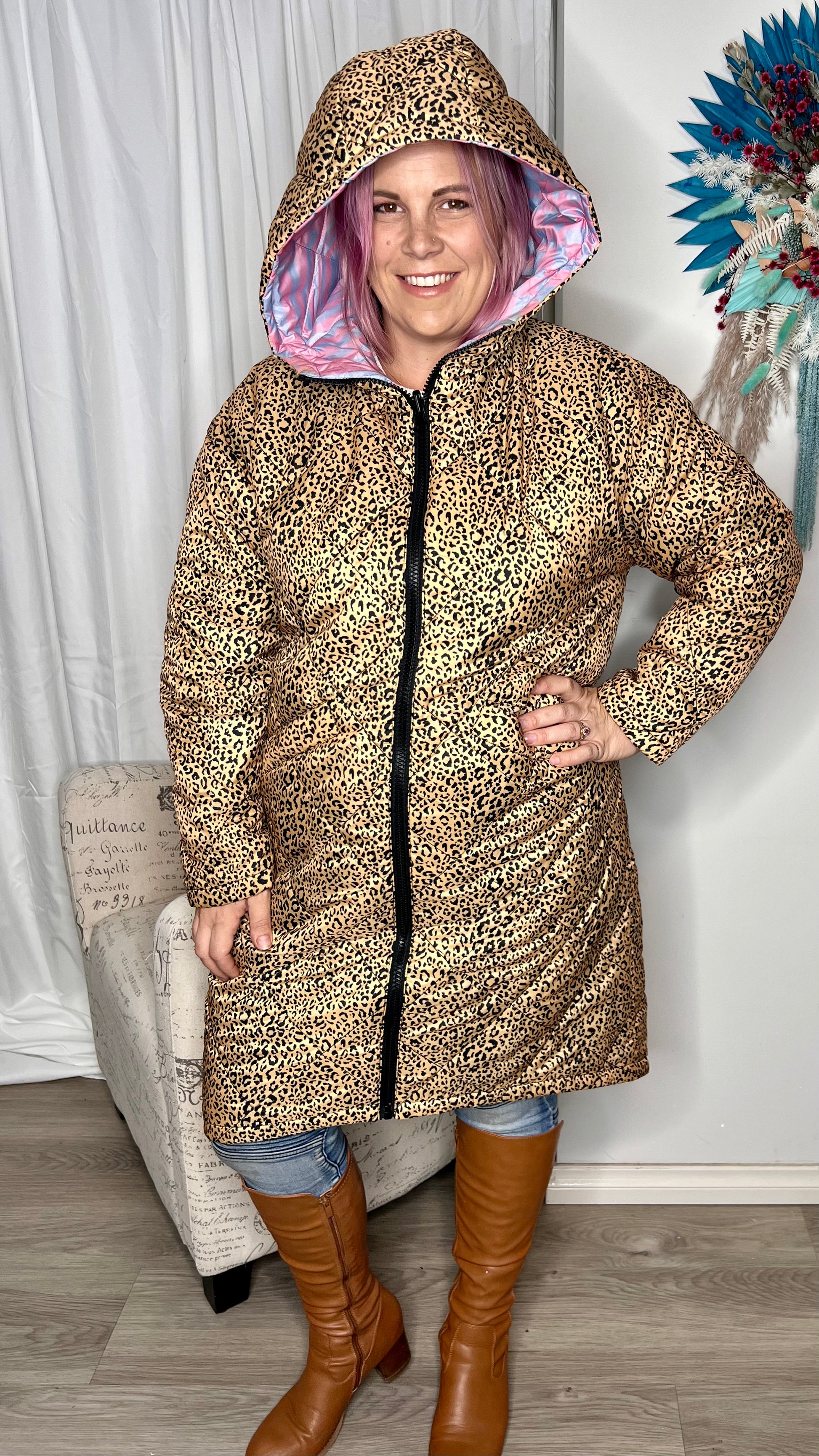 Tasha Reversible Puffer Jacket: Introducing the Tasha Puffer Reversible Jacket, the ultimate statement piece for your winter wardrobe. Featuring a groovy psychedelic print on one side and leopard p - Ciao Bella Dresses - Sass Clothing