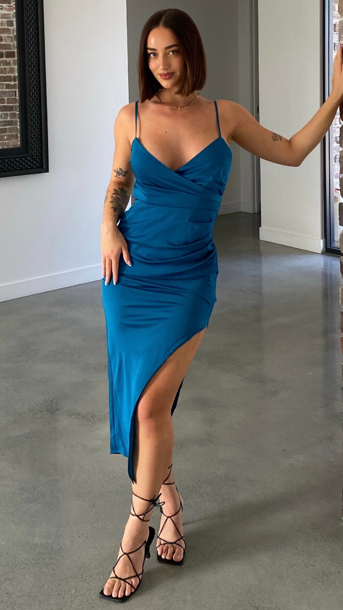 Haidee Dress: 
This satin feel cocktail dress is the perfect addition to your next girls night or cocktail function

Zip up back
Adjustable straps
Choose size according to your bo - Ciao Bella Dresses 