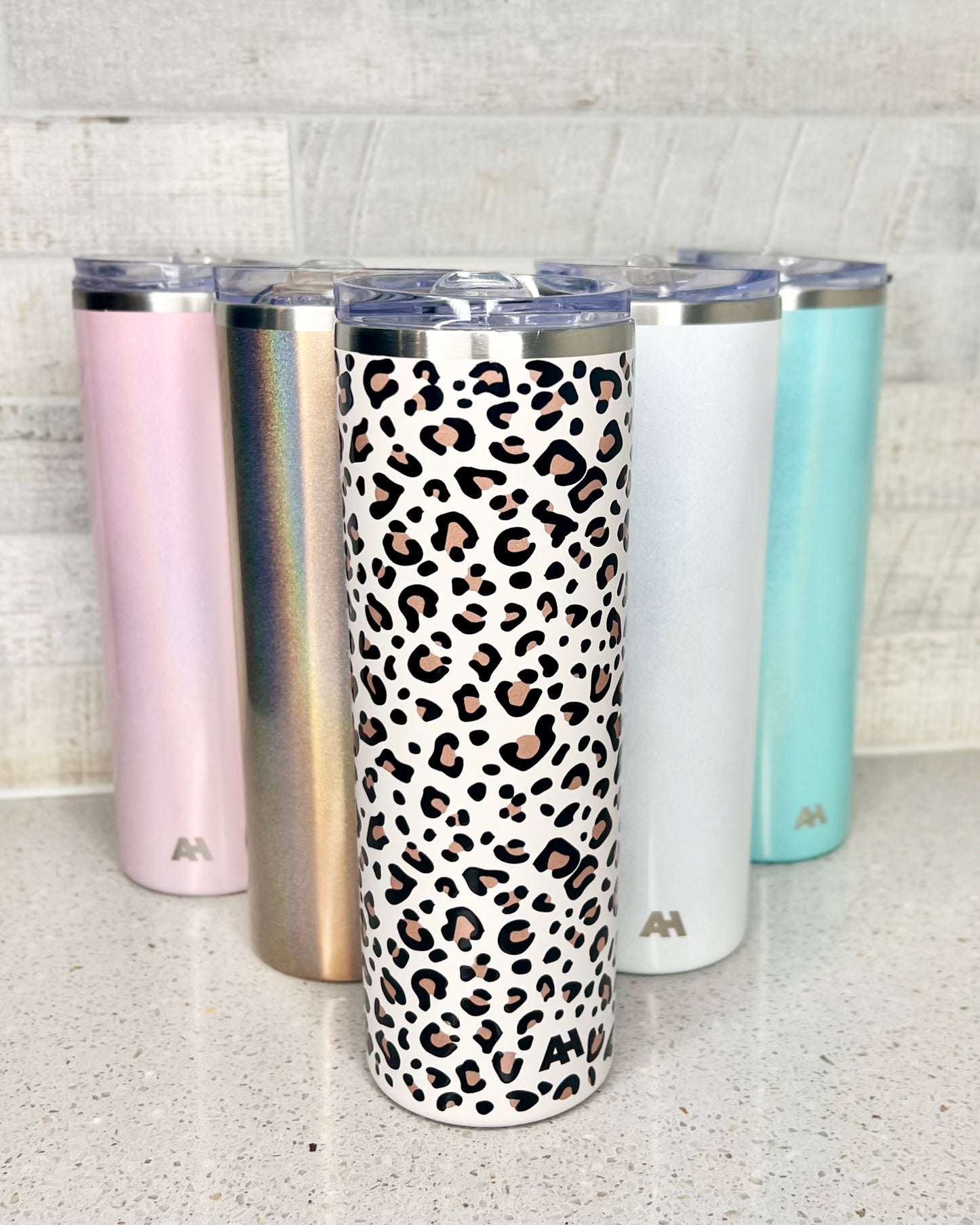 SKNY Slim Vacuum Insulated Skinny Tumbler | AlcoHolder | SKNY is minimal and stunning in design. Cup holder friendly yet is able to hold 590ml (20oz) of your favourite beverage. Complete with Stainless Steel 8mm eco straw,