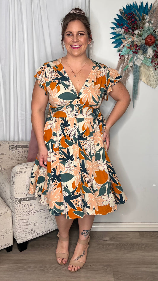 Macie Dress: With super cute flutter sleeves and a gorgeous shaped bust, it is no wonder this is one of our most popular styles. And the exclusive Boho Australia print brings  a  - Ciao Bella Dresses 