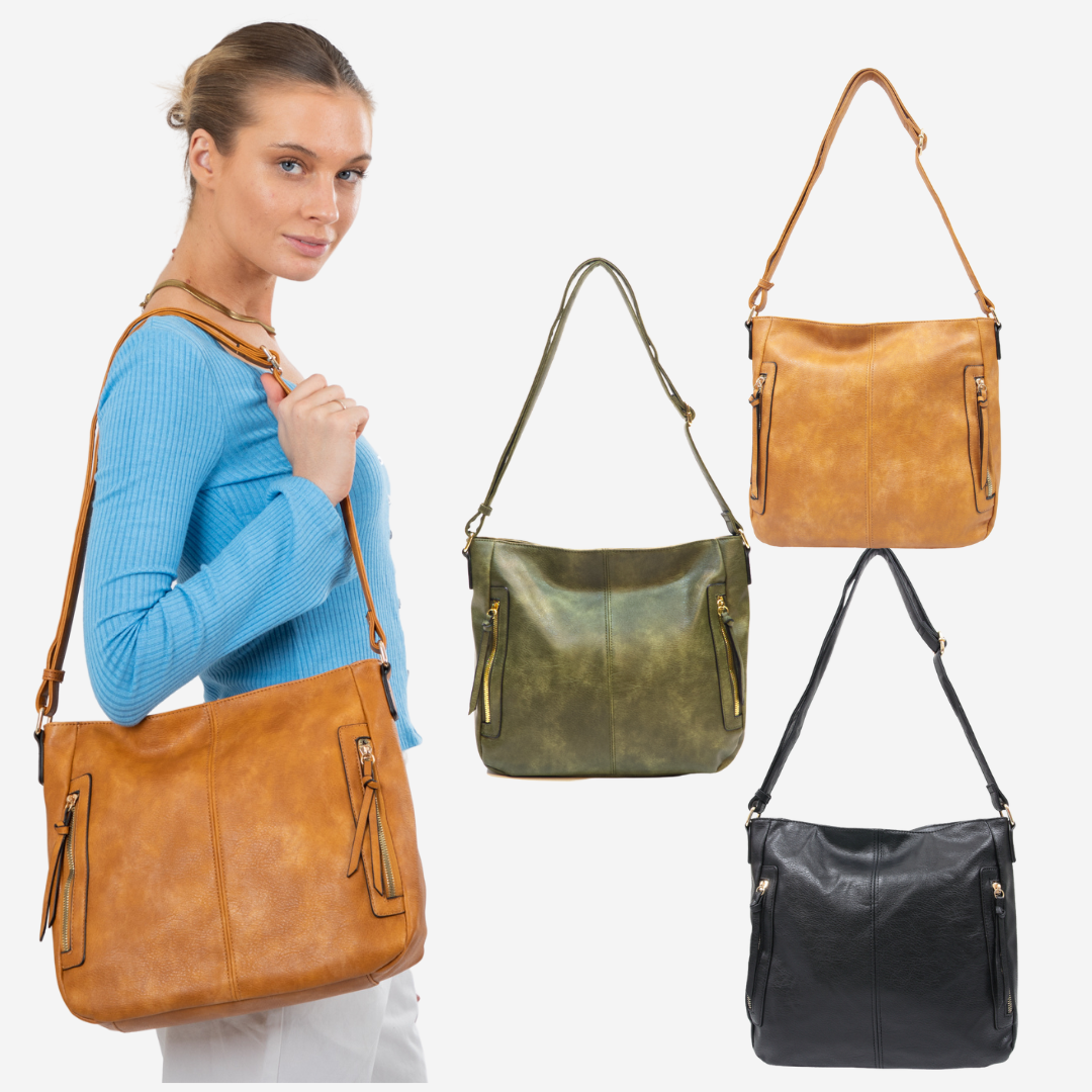 Lizzie Shoulder Bag: A box style shape with two zip features on the front. A simple design made for the on-the-go gal. Long tassels adorn the zips and lead to two large front pockets. An - Ciao Bella Dresses - Sassy Duck