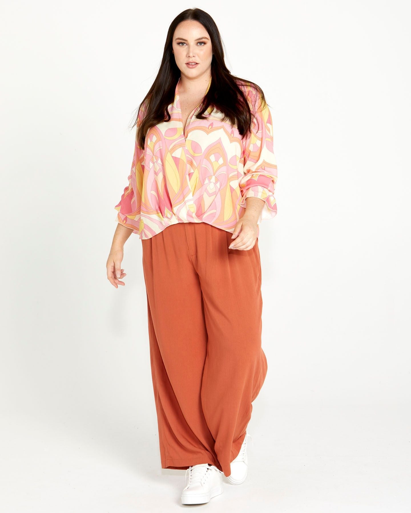 Vivienne Wide Leg Pants - Terracotta | Sass Clothing | Step into style and comfort with the Vivienne Wide Leg Pant! Featuring soft tailoring and a chic, wide leg design, these pants are the perfect choice for keeping you