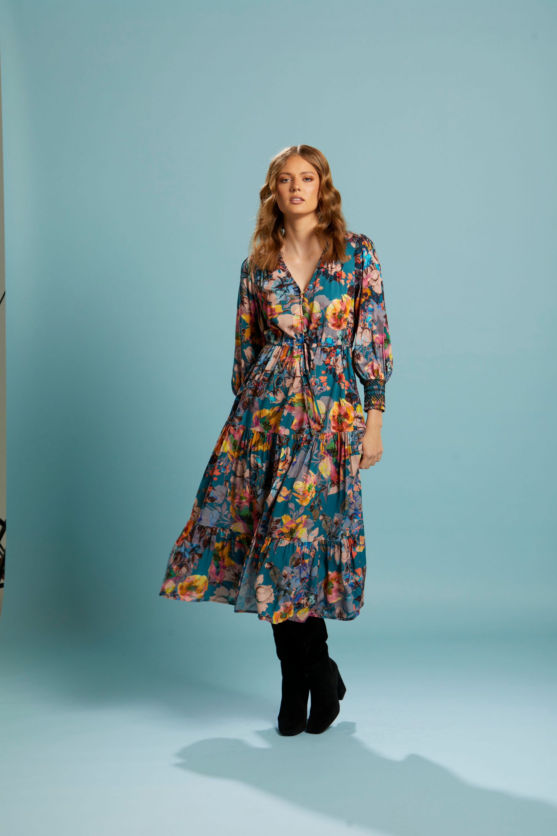 Pure Shores Tiered Midi Dress: Introducing the Pure Shores Tiered Midi Dress, a captivating blend of elegance and versatility. Adorned with a stunning teal bouquet pattern, this dress is a vision  - Ciao Bella Dresses - Fate + Becker