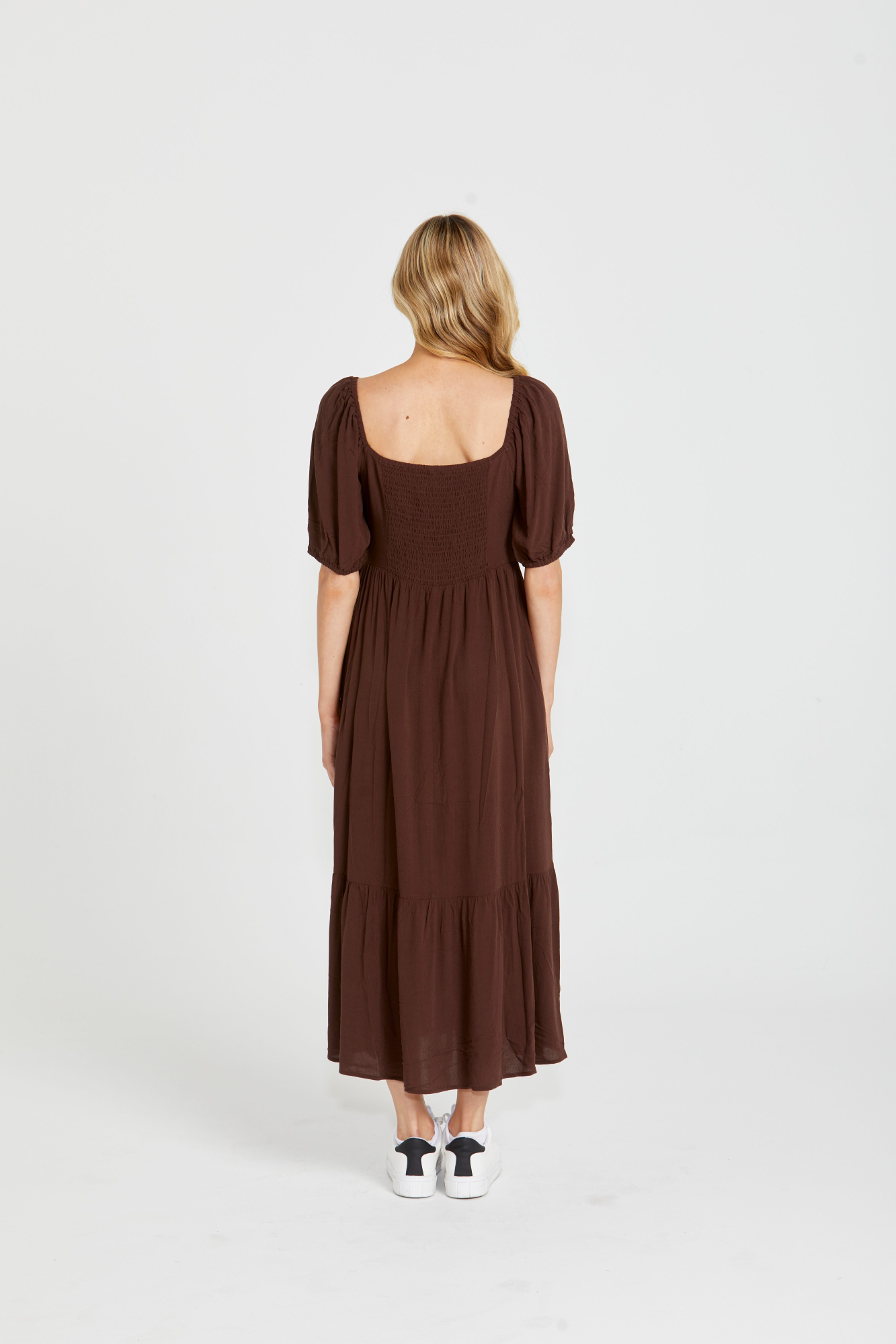 Yasmin Midi Dress - Brown | Sass Clothing | Introducing the Yasmin Frill Hem Midi Dress! With its flirty frill hem and elasticated square neckline, it exudes confidence and grace. The back shirred panel ensure