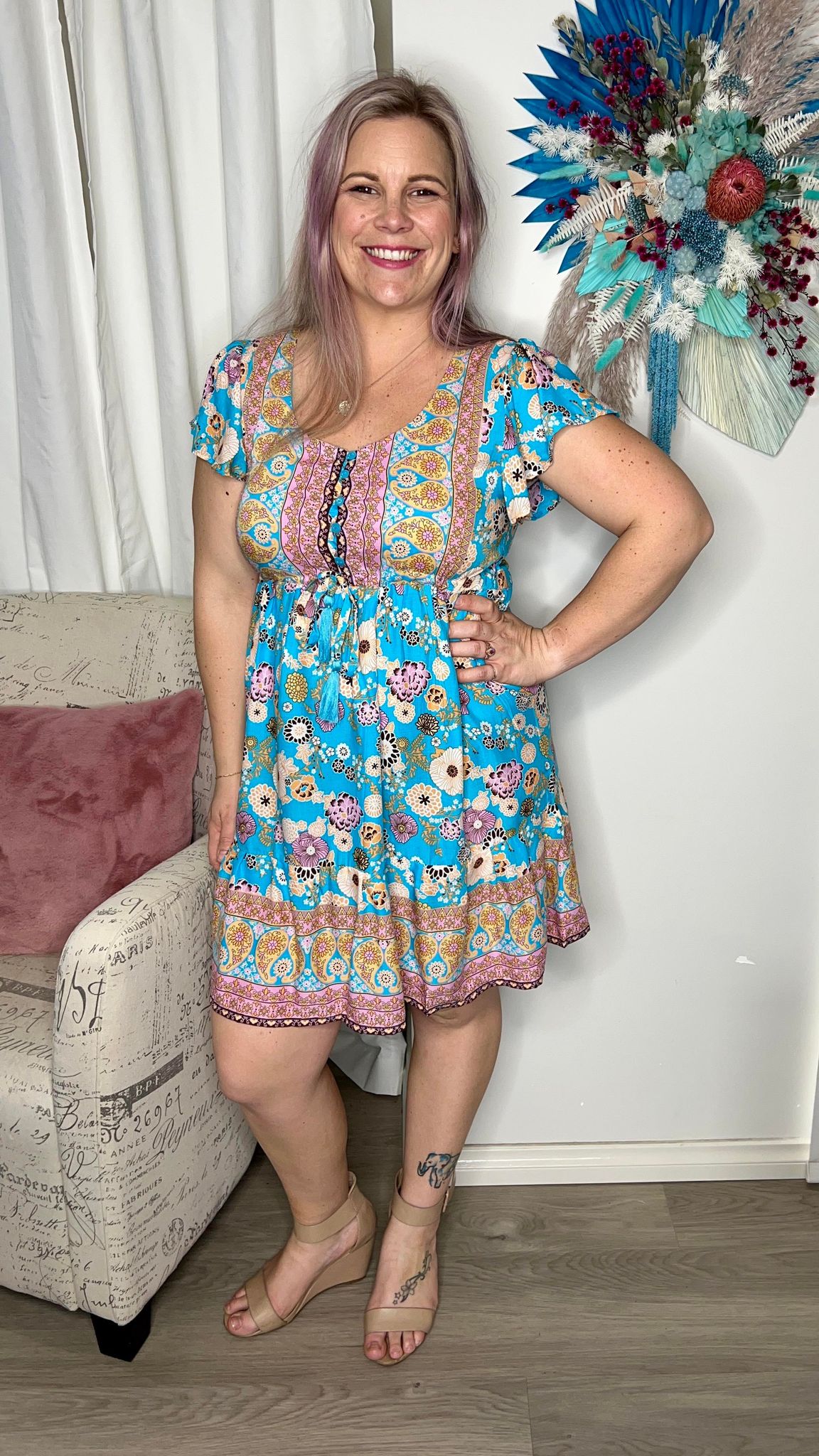 Milla Dress: This sweet little boho dress is such an easy “chuck on and go” style that will make you feel oh so pretty

Functional buttons at bust
Drawstring waist
Prewashed rayo - Ciao Bella Dresses 
