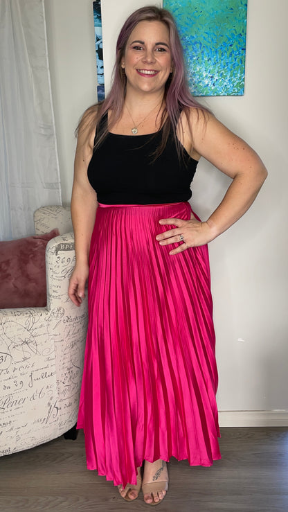 Candy Pleated Skirt: 

True to size
Zip and elasticated back of waist
Polyester
Danika is wearing a size 12

Shop all colours HERE
SKU: XW20259 - Ciao Bella Dresses 