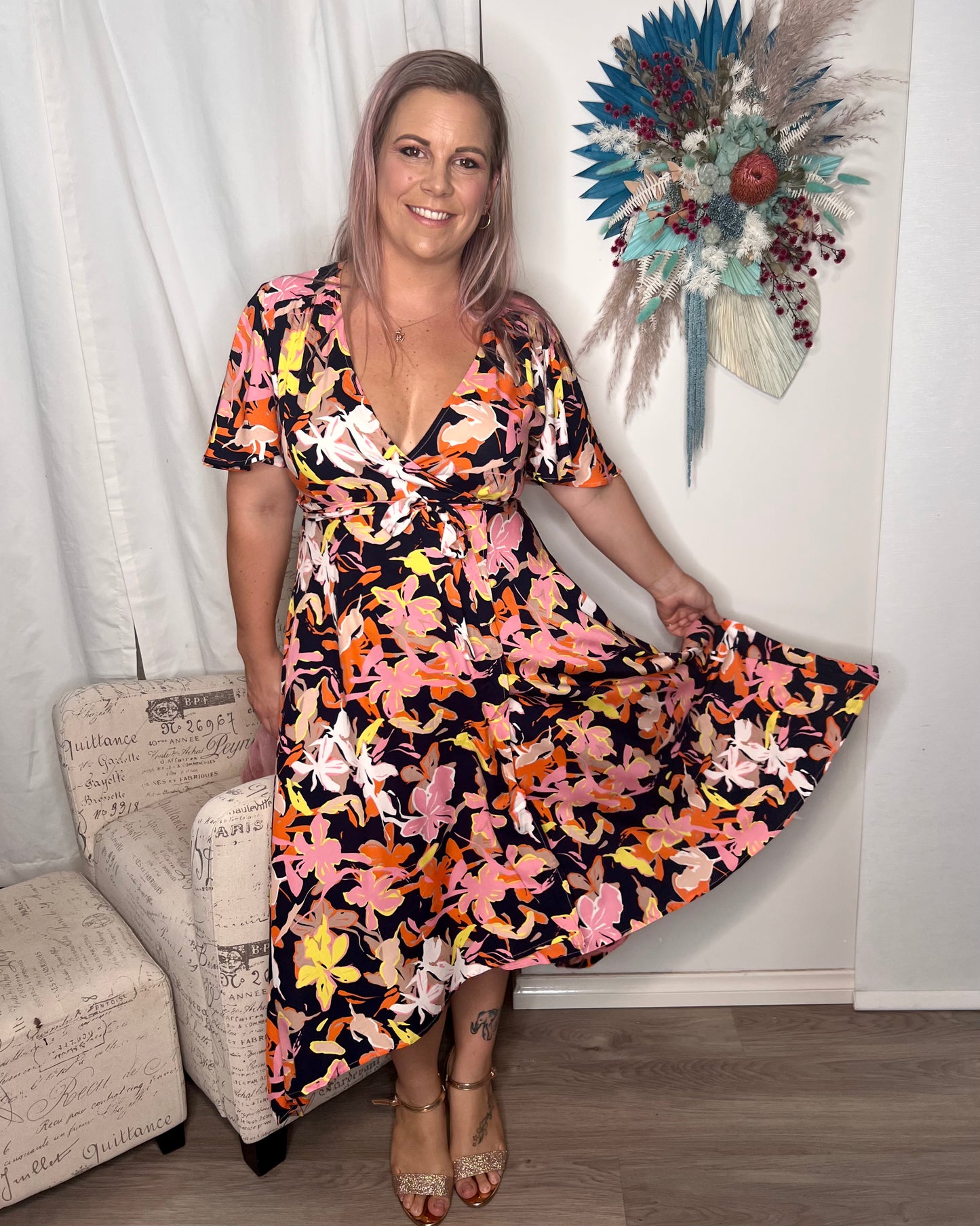 Serena Wrap Dress - Navy Floral: The perfect date night dress is here. This stunning wrap dress comes in a beautiful navy floral print with high-low hem
Features:

Breastfeeding friendly
True wrap d - Ciao Bella Dresses 