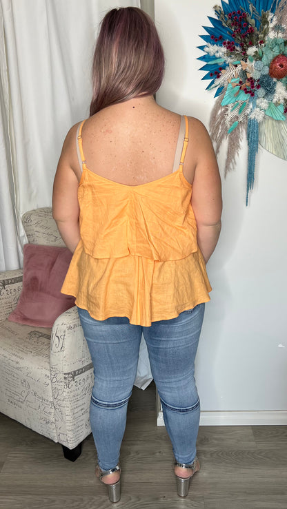 Fifi Cami: 
A two tiered cami, this top is perfect to dress up or dress down with adjustable straps for maximum comfort


Two tiered design
Adjustable straps
V neckline
True to - Ciao Bella Dresses 