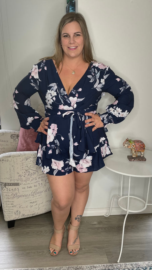 Daphne Playsuit - Navy Blossom | Style State | An old favourite in stunning new prints

Zip up back
Self tying waist sash
Breastfeeding friendly - pull aside to feed
Elasticated wrists
True to size
Danika wears a