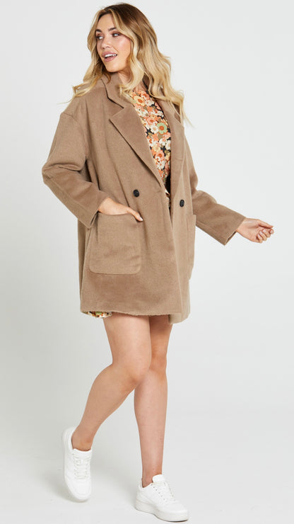 Arden Double Breasted Coat: 
Feast your eyes on the Arden Double Breasted Coat, featuring a heritage vintage design with a button-up front and pockets to stash your lipstick and phone. This coa - Ciao Bella Dresses 