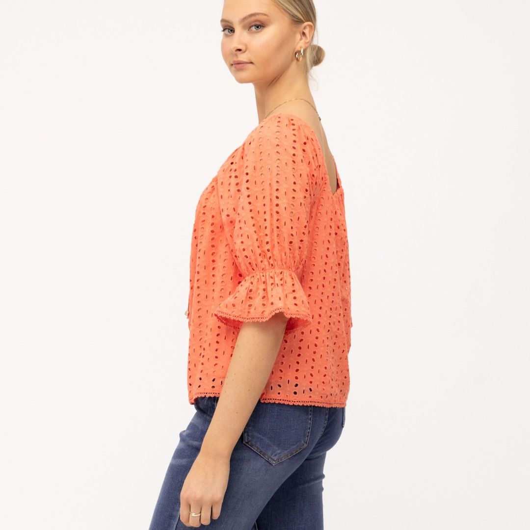 Jeans and a nice top? We got you!
The Emily Broderie Top is perfect to dress down with denim shorts, wear out with jeans or dress up with a maxi skirt

Broderie - 10 - Emily Broderie Top - Tangerine - Label of Love