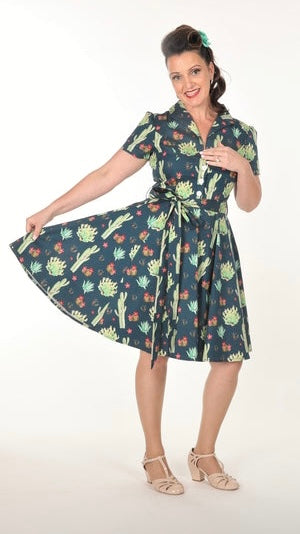 Betty Dress - Arizona Garden | Miss Molly M Designs | 
The Betty Dress features a fitted shirt waist bodice with 4 buttons, cinched waist, flared skirt, turn down collar, side pockets, fully lined bodice, short sleeves,