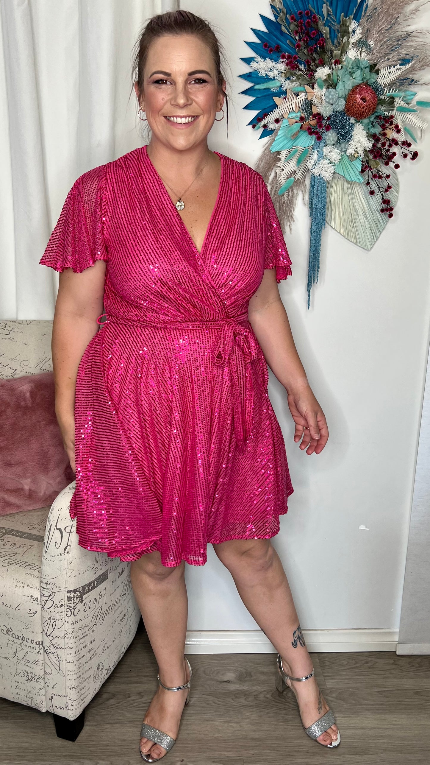 Myria Sequin Dress - Hot Pink | Roseason | Myria is here and ready to party! This sequin number is a fun and flirty mini dress, perfect for dancing the night away

Bra friendly
Pull aside breastfeeding access