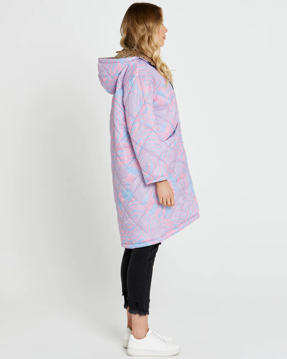 Tasha Reversible Puffer Jacket: Introducing the Tasha Puffer Reversible Jacket, the ultimate statement piece for your winter wardrobe. Featuring a groovy psychedelic print on one side and leopard p - Ciao Bella Dresses - Sass Clothing