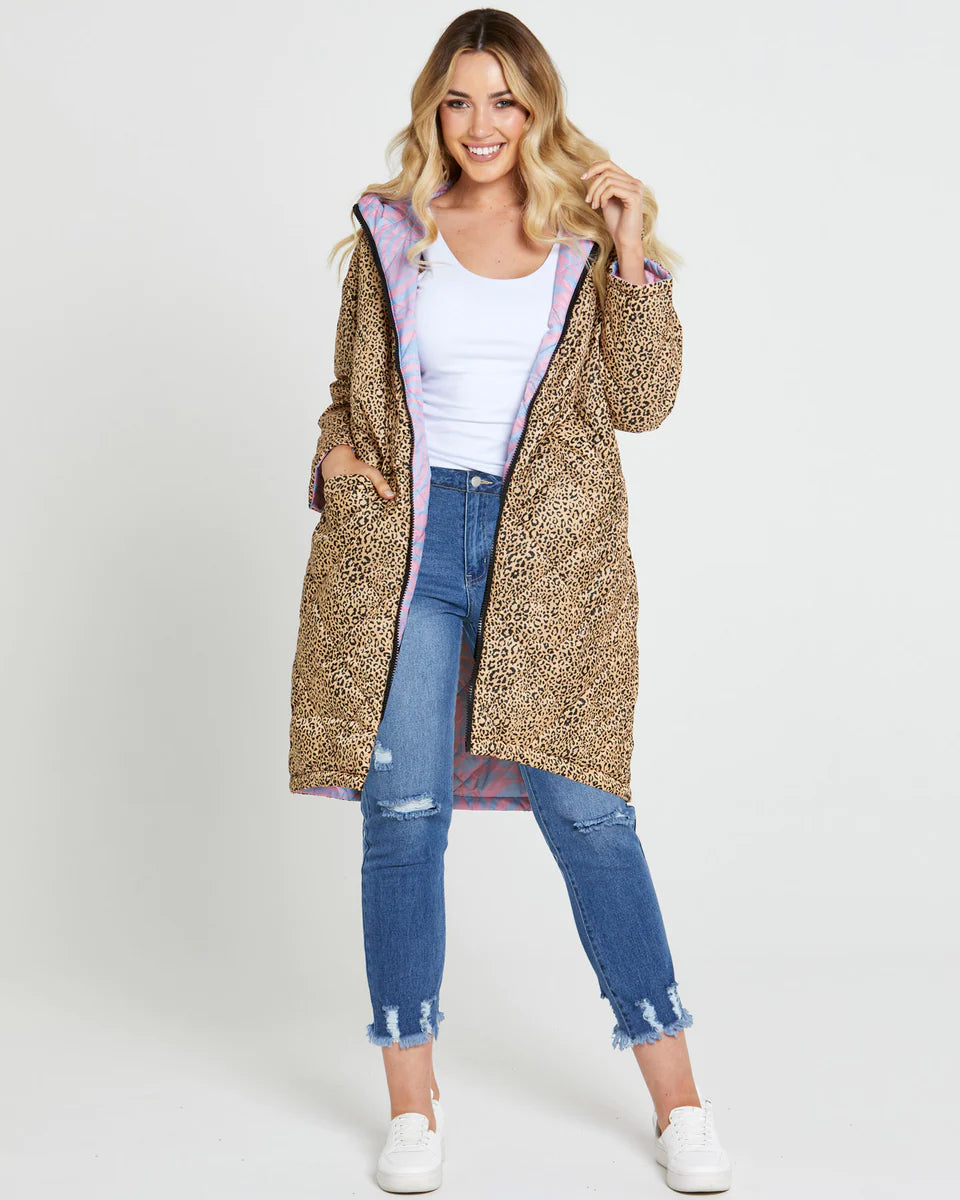 Tasha Reversible Puffer Jacket: Introducing the Tasha Puffer Reversible Jacket, the ultimate statement piece for your winter wardrobe. Featuring a groovy psychedelic print on one side and leopard p - Ciao Bella Dresses - Sass Clothing