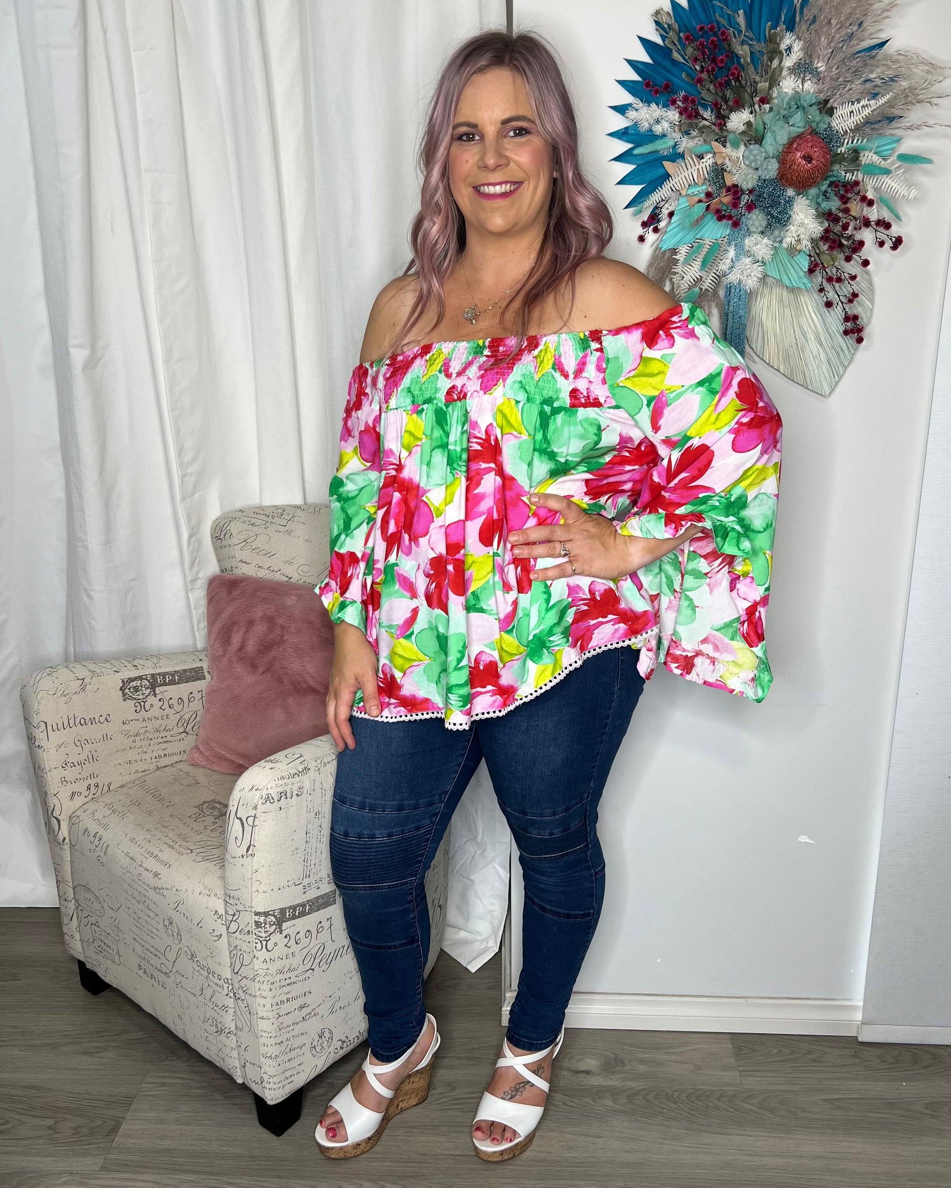 Reese Top - Multi Floral: Holiday vibes time a hundred! The Reese Top brings comfort and effortless vibes together in a beautiful flash of colour

Floaty bell sleeves
Shirred band at top can  - Ciao Bella Dresses 