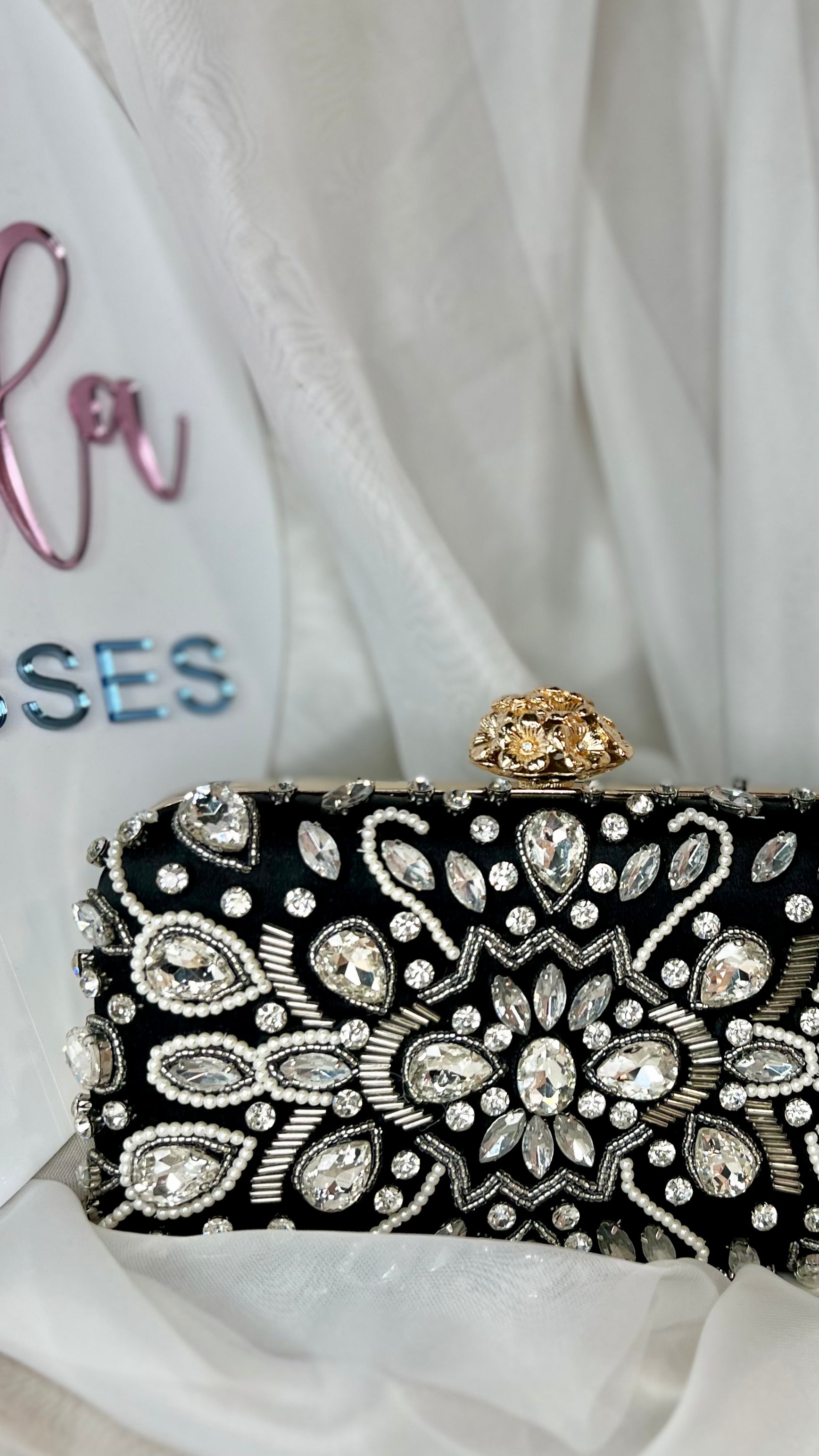 Elana Evening Bag: This stunning piece will bring together your evening outfit with it’s gorgeous pops of bling against a contrasting black satin background
Features:

Interchangable c - Ciao Bella Dresses - Tripp Australia