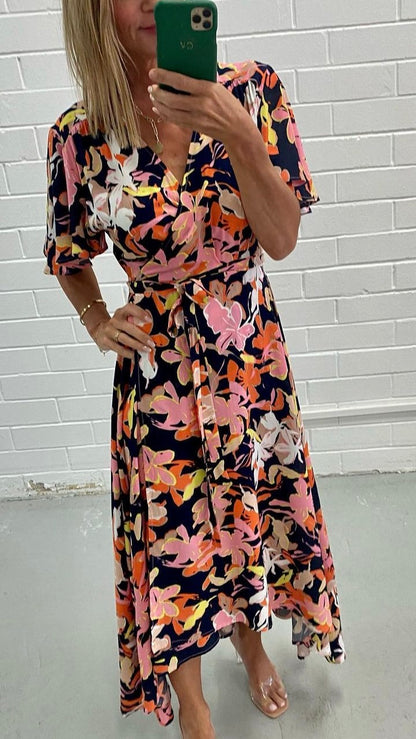 Serena Wrap Dress - Navy Floral: The perfect date night dress is here. This stunning wrap dress comes in a beautiful navy floral print with high-low hem
Features:

Breastfeeding friendly
True wrap d - Ciao Bella Dresses 
