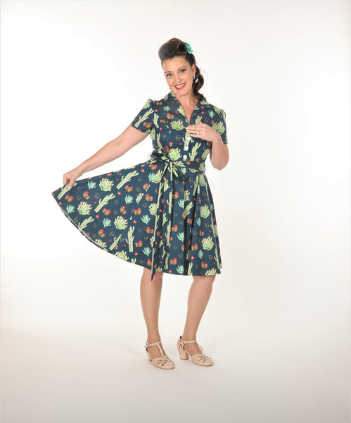 Betty Dress - Arizona Garden | Miss Molly M Designs | 
The Betty Dress features a fitted shirt waist bodice with 4 buttons, cinched waist, flared skirt, turn down collar, side pockets, fully lined bodice, short sleeves,