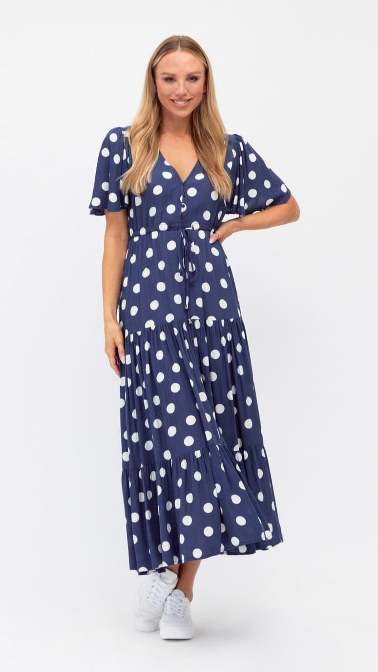 Libby Dress: The Libby Dress comes in one of our most popular cuts with a button down bust, flutter sleeves and a flowy skirt
Features:

Button’s at bust - breastfeeding friendly - Ciao Bella Dresses 