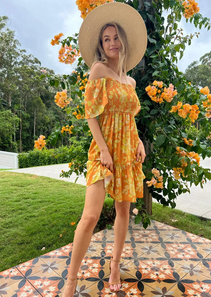 Maya Dress - Sunrise: Shine like a ray of sunshine in the Maya Dress. This sweet little number has sleeves that can be worn on or off the shoulder and a shirred bust, giving it a gorgeous - Ciao Bella Dresses 
