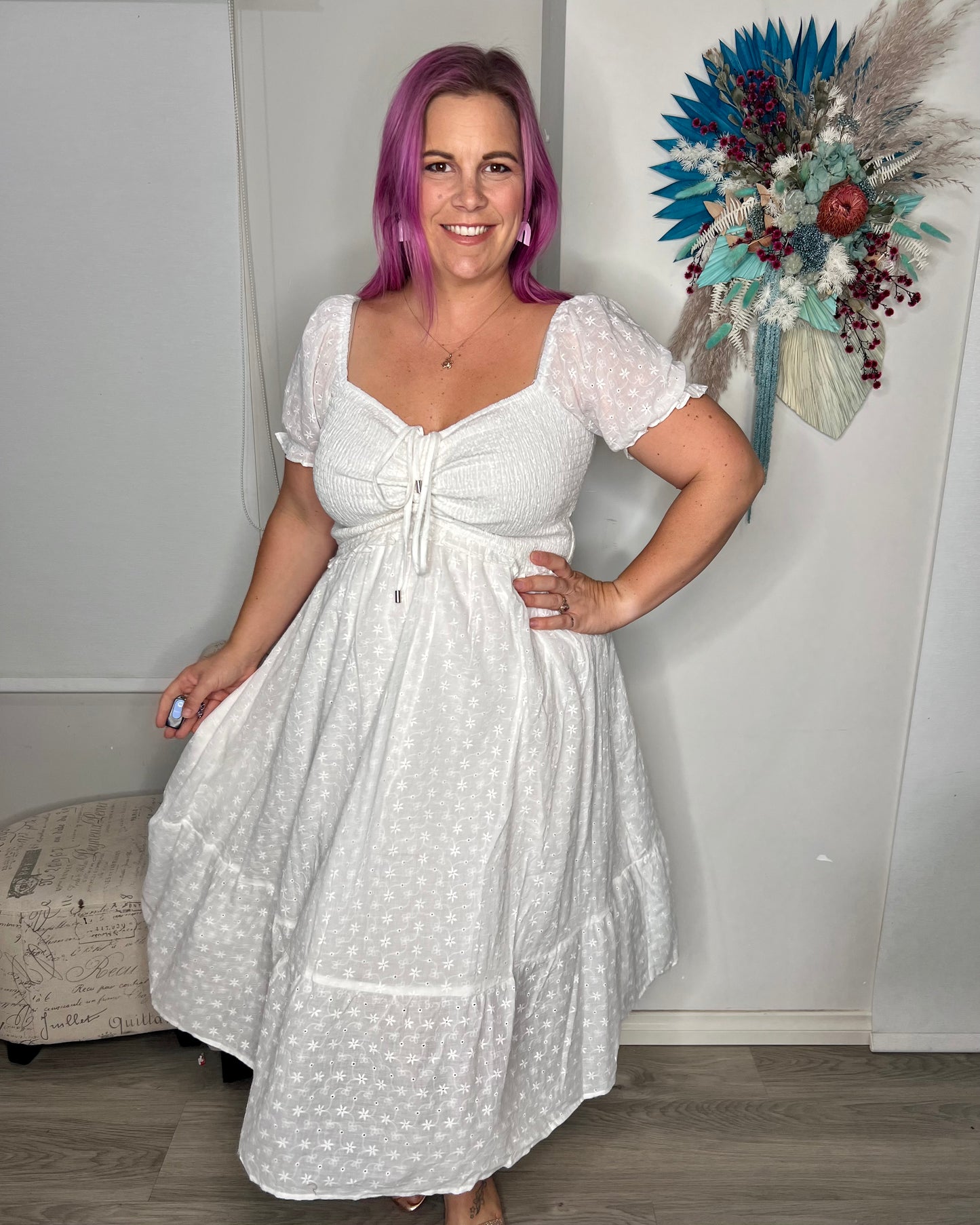 Addalyn Midi Dress: The Addalyn Midi Dress in white anglaise is a versatile piece that can be worn on or off the shoulder. Its rouched bust and midi length create a chic and feminine si - Ciao Bella Dresses 