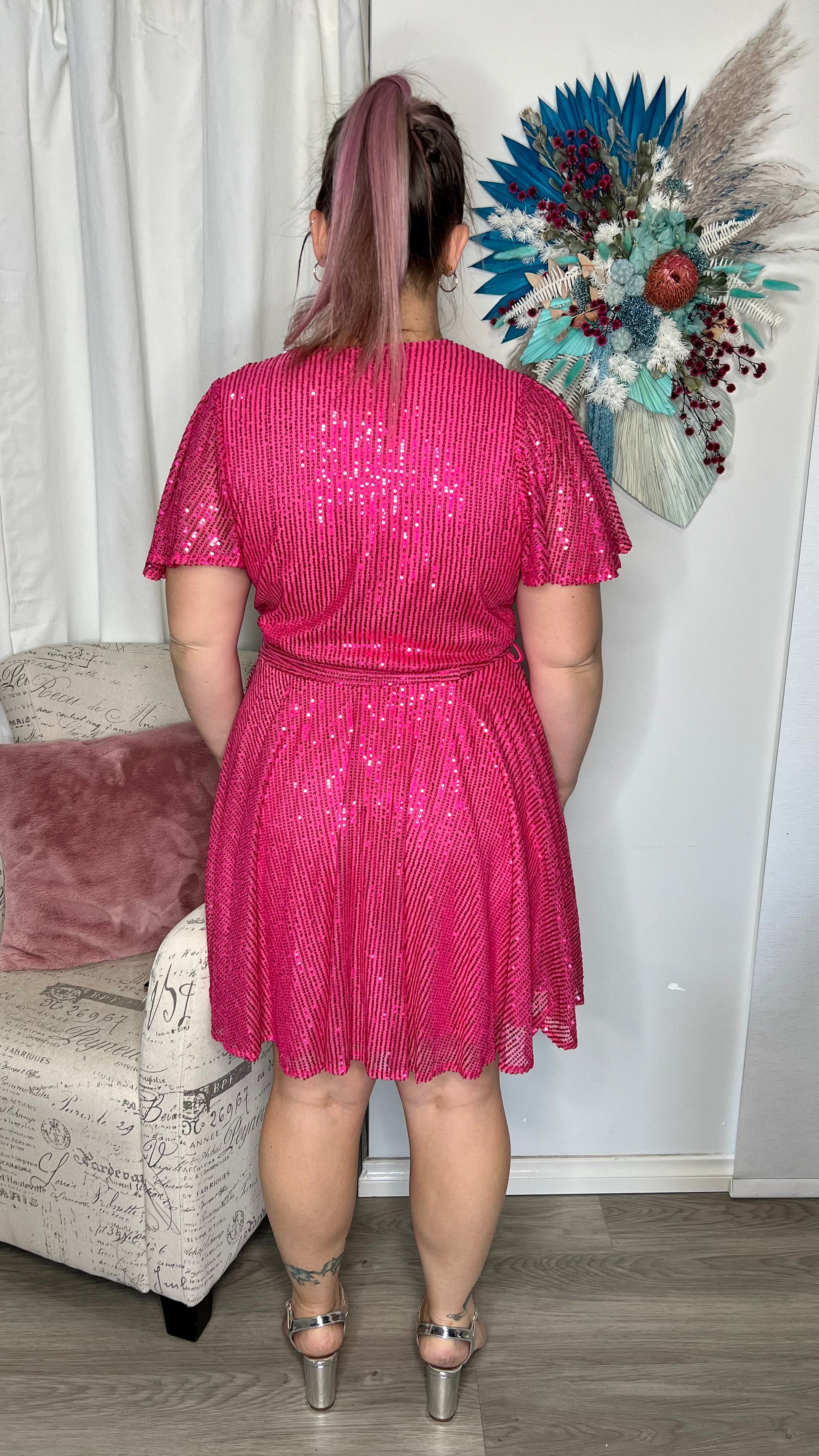 Myria Sequin Dress - Hot Pink | Roseason | Myria is here and ready to party! This sequin number is a fun and flirty mini dress, perfect for dancing the night away

Bra friendly
Pull aside breastfeeding access