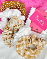 Sage + Stone Handmade Neutral Boho Scrunchies | Sage + Stone | Hand made in Bunbury WA by Sage + Stone, these beautiful pieces bring a sweet neutral boho vibe to your wardrobe

Handmade with various fabrics
Please see photos for