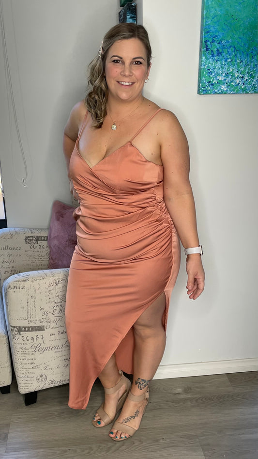 Haidee Dress - Copper | Style State | 
This satin feel cocktail dress is the perfect addition to your next girls night or cocktail function

Zip up back
Adjustable straps
Choose size according to your bo