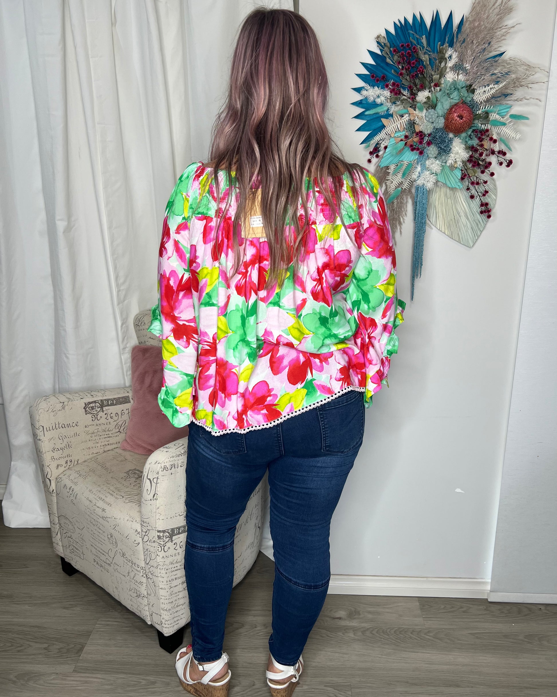 Reese Top - Multi Floral: Holiday vibes time a hundred! The Reese Top brings comfort and effortless vibes together in a beautiful flash of colour

Floaty bell sleeves
Shirred band at top can  - Ciao Bella Dresses 