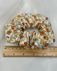 Sage + Stone Handmade Neutral Boho Scrunchies | Sage + Stone | Hand made in Bunbury WA by Sage + Stone, these beautiful pieces bring a sweet neutral boho vibe to your wardrobe

Handmade with various fabrics
Please see photos for