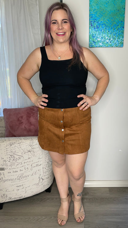 Becca Suedette Skirt: 
All your retro dreams have come true! Sweet and chic in Suedette the Becca Skirt is the perfect casual mini for your winter style. With a slimming high waisted silh - Ciao Bella Dresses 