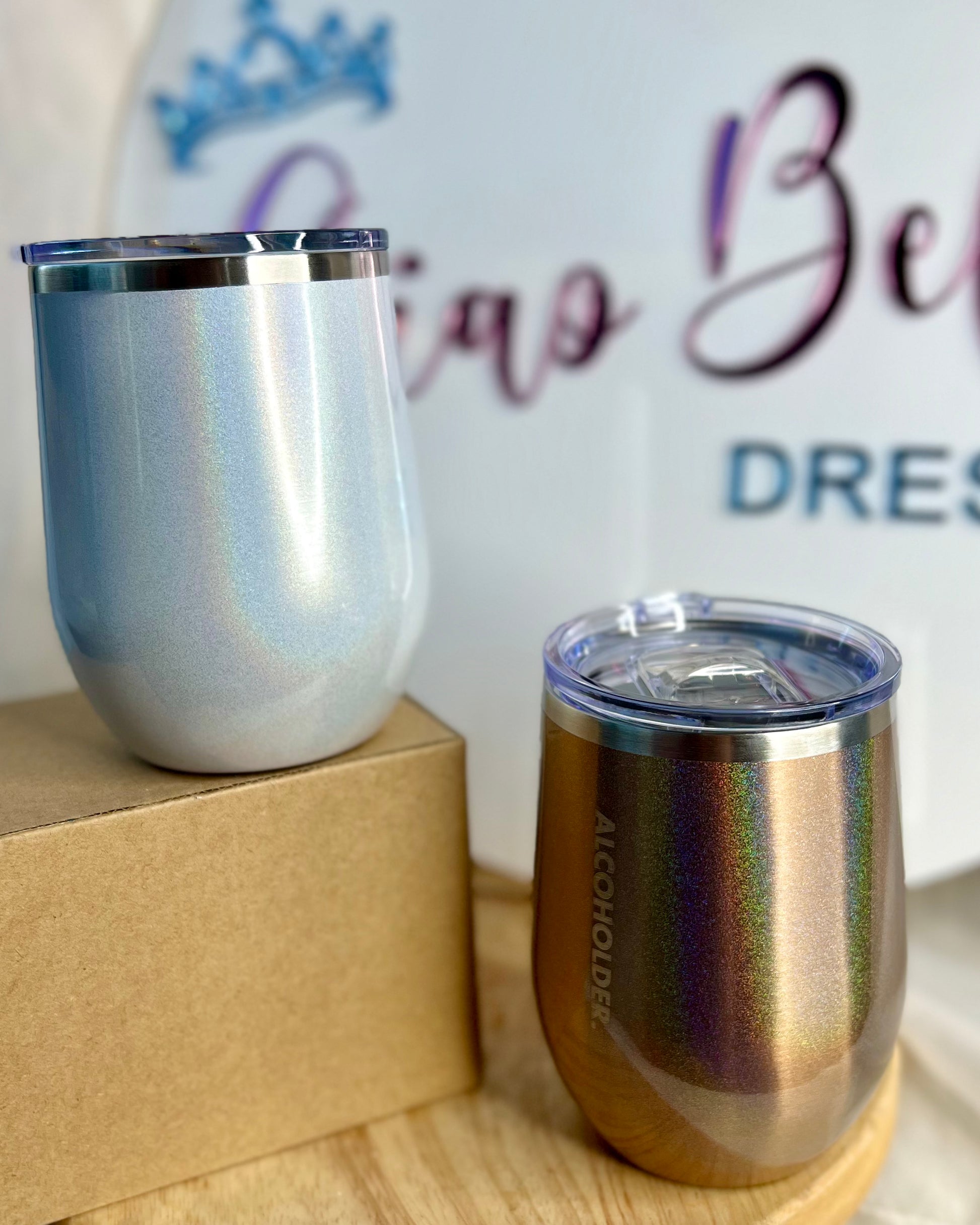 Stemless Vacuum Insulated Tumbler: 
Shaped for comfort and designed for practicality, the Stemless Insulated Tumbler will hold 415ml of liquid and keep it cool for up to 12hrs. What's neat is it'll al - Ciao Bella Dresses - AlcoHolder