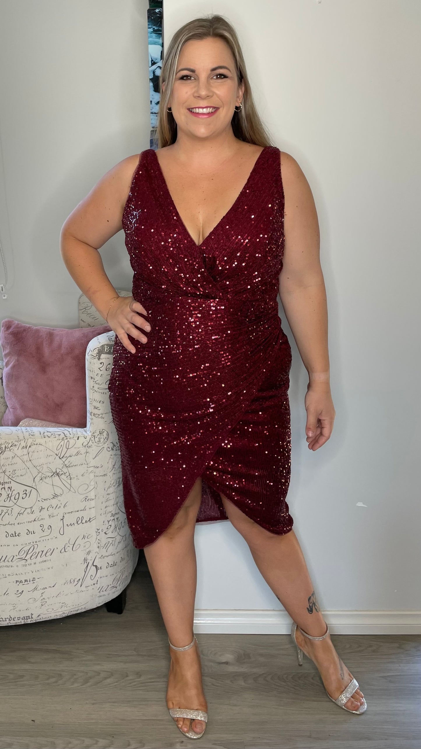 
Be the life of the party in our Kim v-wrap sequin midi! Get in a bit of glam with these glitzy sequins paired with a stunning wrap skirt. It's the perfect dress for - Kim Sequin Dress - Wine - Lumier by Bariano