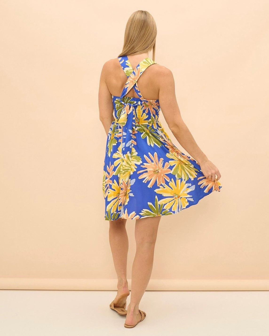 Mae Dress: This sweet little summer dress will brighten the day of everyone around you
Features:

Shirred panels at side for adjustable bust
Convertible back - wear it in a mul - Ciao Bella Dresses - Iris Maxi