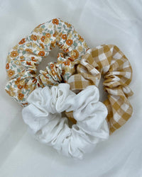 Sage + Stone Handmade Neutral Boho Scrunchies | Sage + Stone | Hand made in Bunbury WA by Sage + Stone, these beautiful pieces bring a sweet neutral boho vibe to your wardrobe

Handmade with various fabrics
Please see photos for