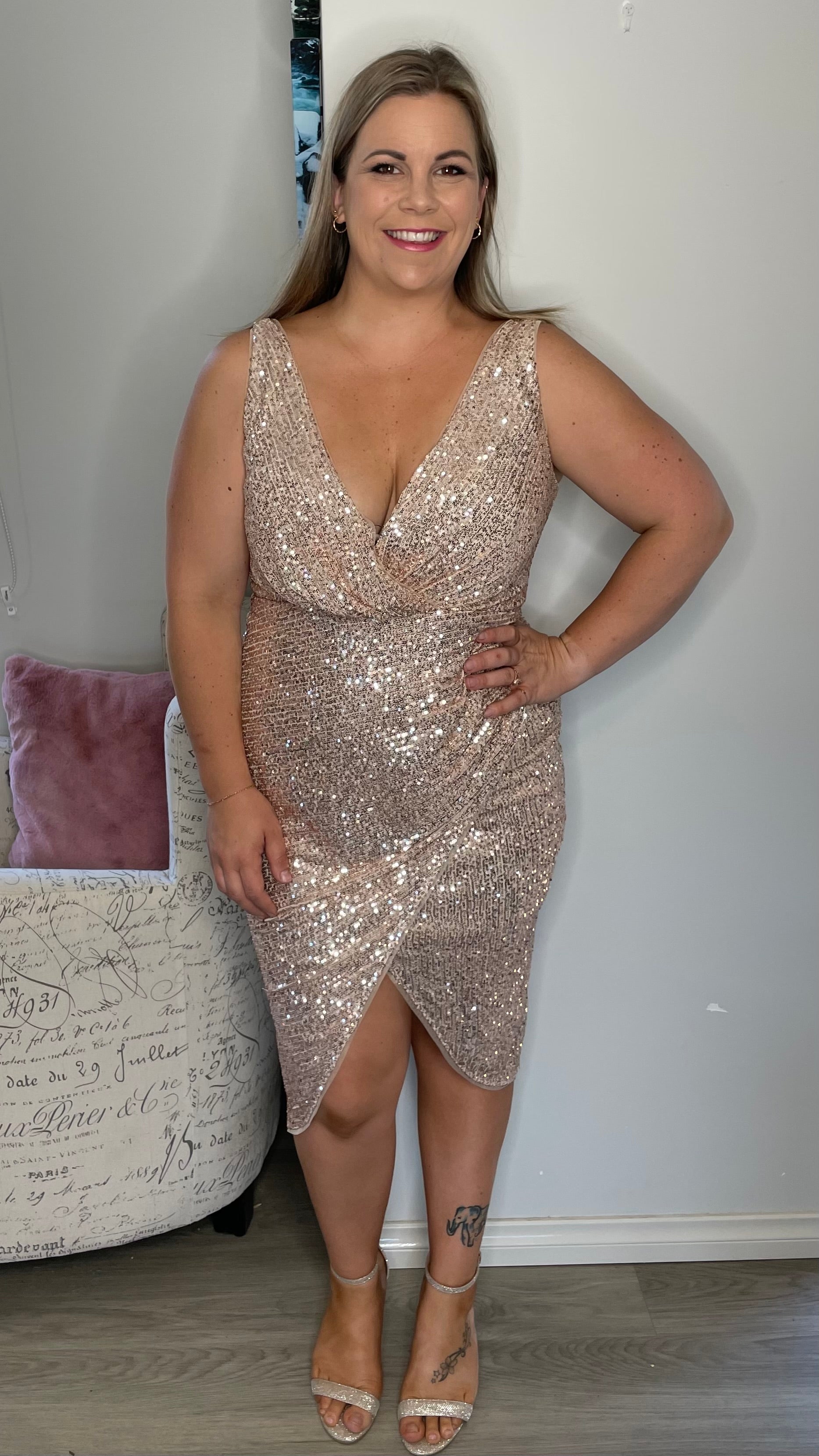 Be the life of the party in our Kim v-wrap sequin midi! Get in a bit of glam with these glitzy sequins paired with a stunning wrap skirt. It's the perfect dress for  - Kim Sequin Dress - Rose Gold - Lumier by Bariano