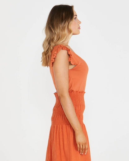 
This summer, we welcome the Naomi Frill Top, the perfect addition to your wardrobe. This top is made from cotton elastane jersey, which makes it soft and comfortabl - NEW Naomi Frill Top - Burnt Orange - Sass Clothing