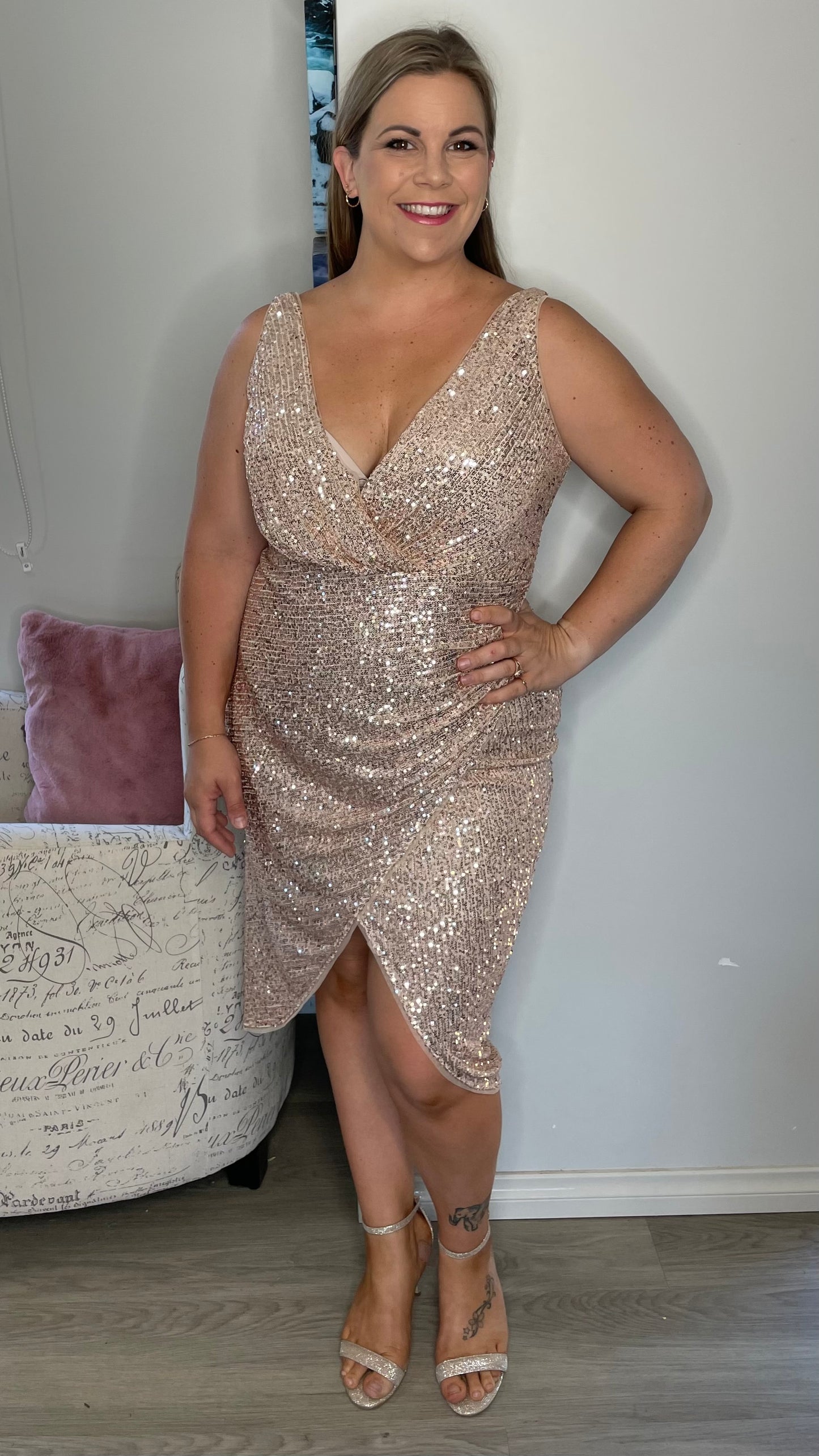 Be the life of the party in our Kim v-wrap sequin midi! Get in a bit of glam with these glitzy sequins paired with a stunning wrap skirt. It's the perfect dress for  - Kim Sequin Dress - Rose Gold - Lumier by Bariano