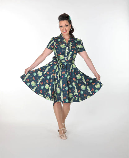 Betty Dress - Arizona Garden | Miss Molly M Designs | 
The Betty Dress features a fitted shirt waist bodice with 4 buttons, cinched waist, flared skirt, turn down collar, side pockets, fully lined bodice, short sleeves,