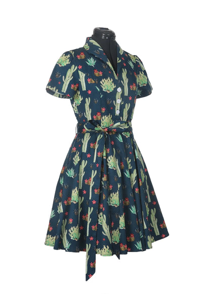 Betty Dress - Arizona Garden | Miss Molly M Designs | 
The Betty Dress features a fitted shirt waist bodice with 4 buttons, cinched waist, flared skirt, turn down collar, side pockets, fully lined bodice, short sleeves,