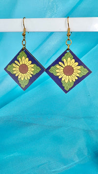 These beautiful pieces have been handmade in North Vietnam, with proceeds going towards educating children at Phu Ninh Children’s Home
Please take care when wearing  - Wooden Earrings - Handmade